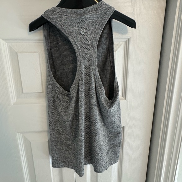 Swiftly Tech High Neck Racerback Tank Top 2.0
Waist Length - Picture 2 of 4